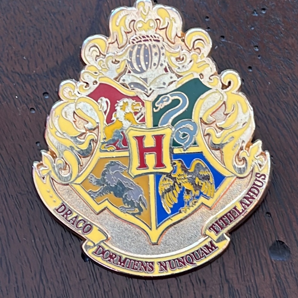 Warner brothers Harry Potter’s school crest with all houses crests within